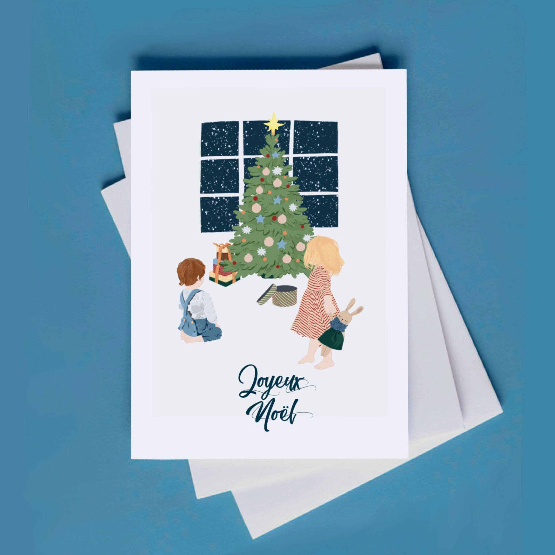 carte noel enfants cadeaux sous le sapin